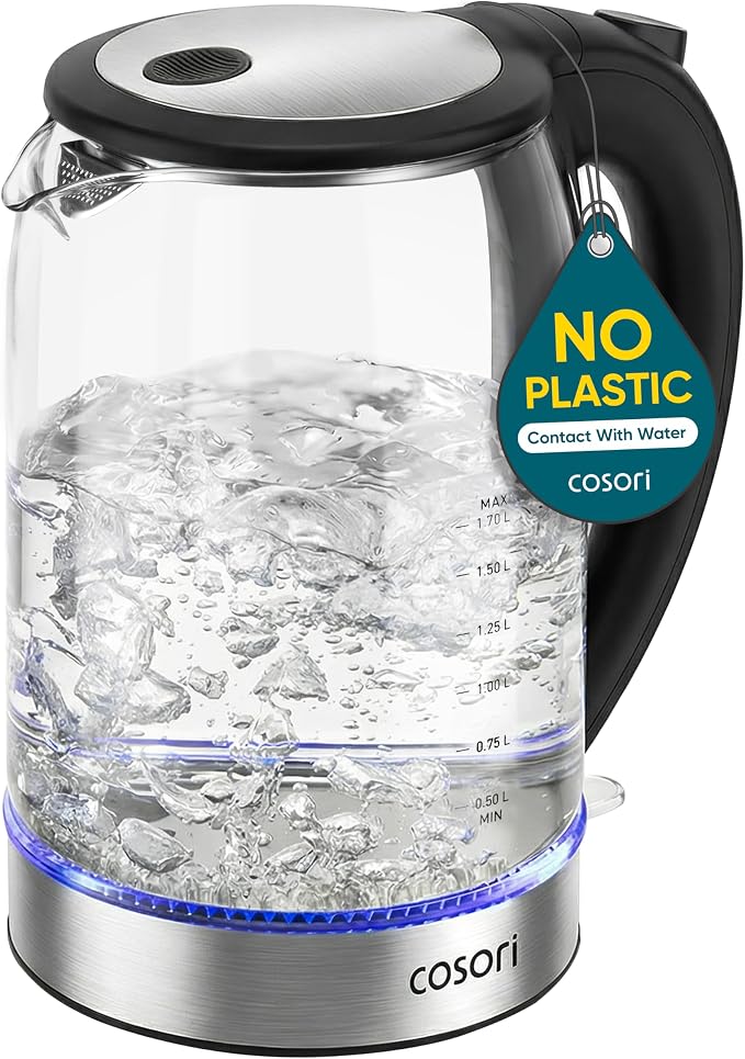 Cosori glass electric kettle styled on an organized kitchen countertop