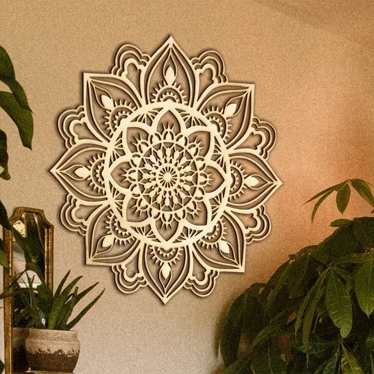 Cut metal Moroccan mandala wall panel mounted on a plain living room wall, showing the shadow pattern it casts